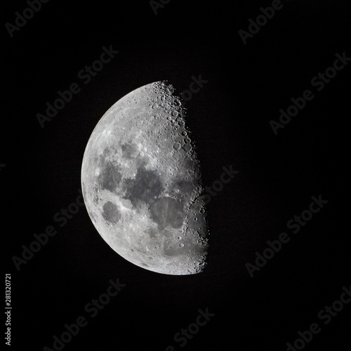 The half moon in orbit.