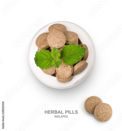 Isolate herbal pills in an open bottle.  Top view. Alternative supplement for good health. Flat lay. Phytotherapy. Рharmacological concept. Creative template for design, page layout.