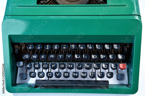 antique green typewriter, analogical typing