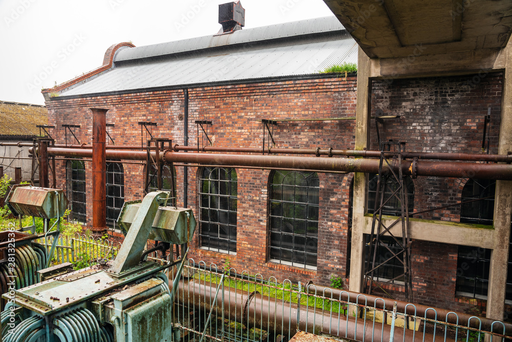 Abandoned brick industrial building on a rainy day Abandoned brick industrial building on a rainy day