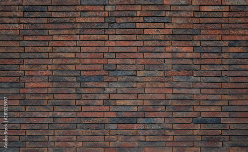 Background of an old brick wall in dark red and grey blue colors