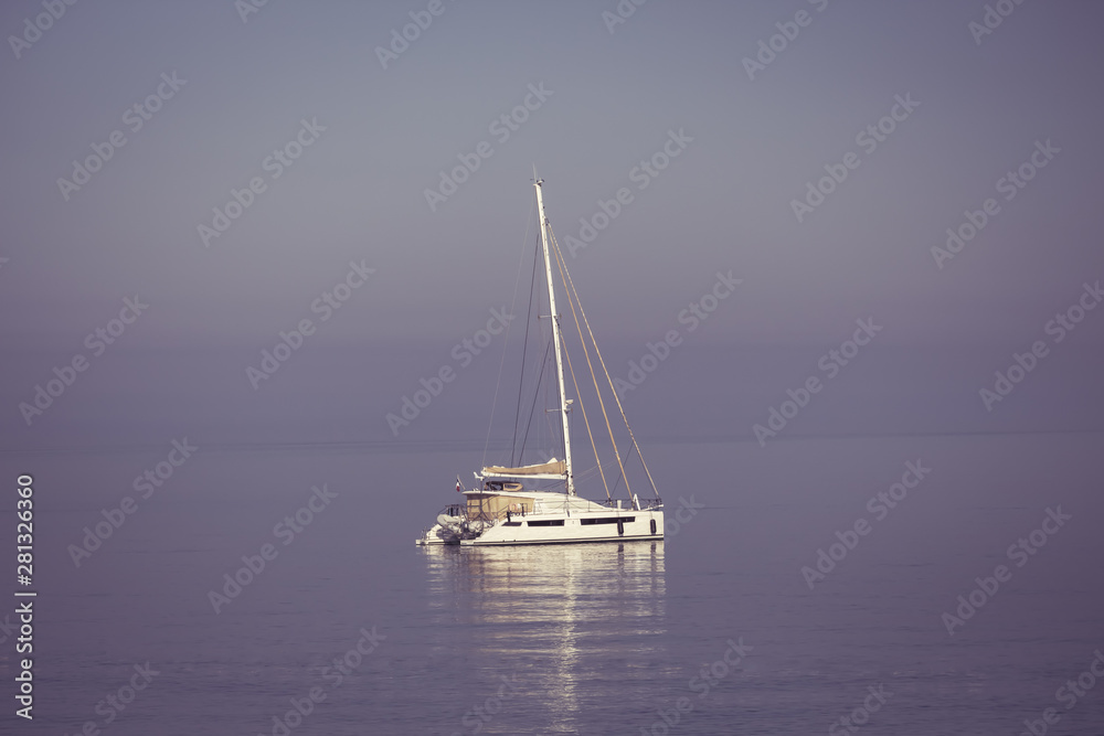 yacht on a background of sea sunset, concept of expensive luxury vacation