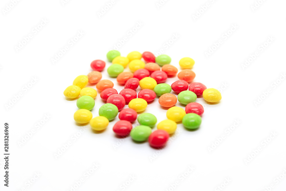 Bright multicolored candy on a white background Bright multicolored candy on a white background