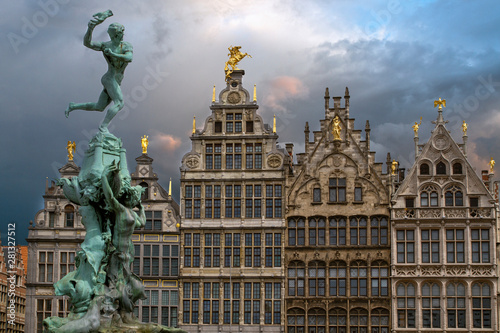 Fontana de Brabo and historical buildings on the Grote Markt square in Antwerp. The main attraction of Antwerp .Houses of guilds in background. Belgium. Europe. European travel.