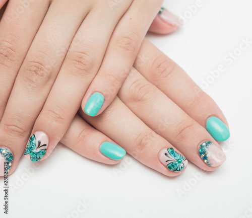 Nails with green baterfly nail polish design