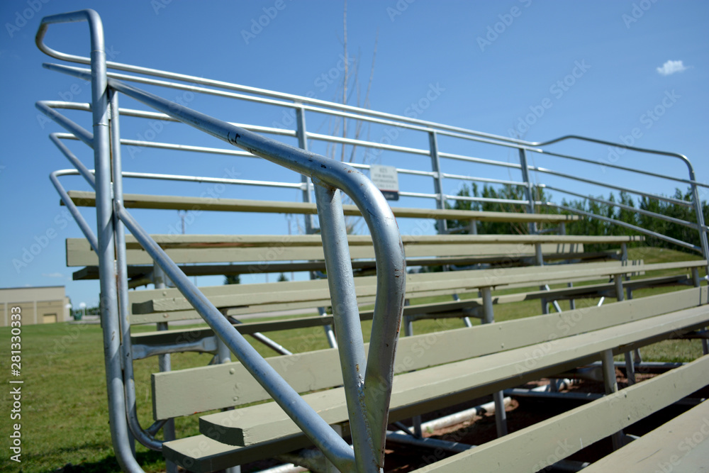 Bleachers at basefield field at a local community park.