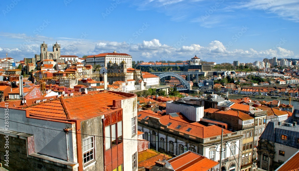 Panoramic view of Douro river and rooftops of Porto, Portugal