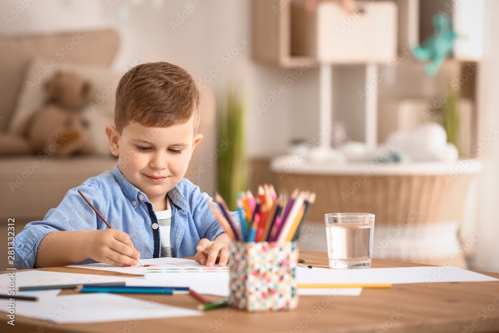 Cute little boy painting at home - obrazy, fototapety, plakaty 