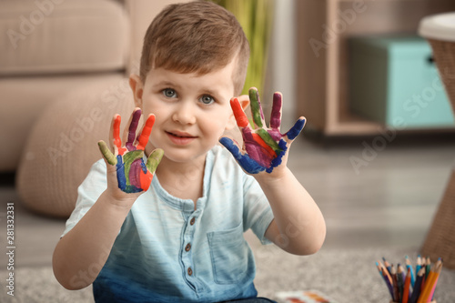 Cute little boy with hands ...