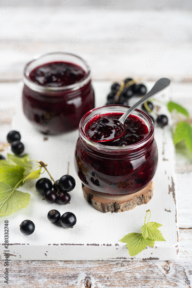 Two jars with black currant jam
