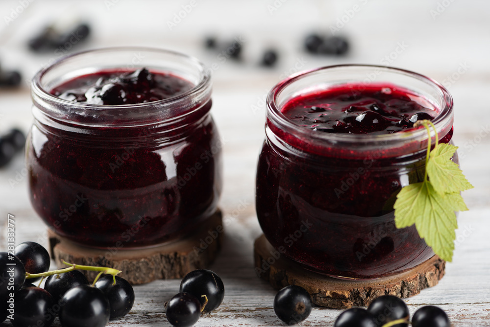 Two jars with black currant jam