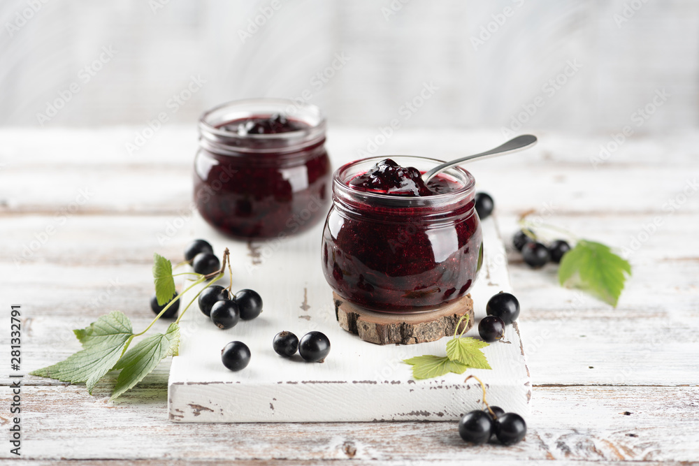 Two jars with black currant jam