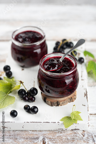 Two jars with black currant jam