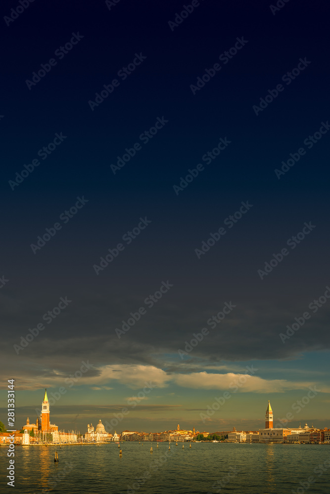 Fototapeta premium Early evening with sunset at amazing Venice watery downtown, Italy, summer time