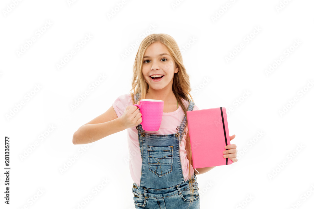 Schoolgirl with book or notepad and mug having tea break. Water balance concept. Enjoying tea before school classes. Relax and recharge. Inspiring drink. Girl cute child long hair drink cocoa or tea