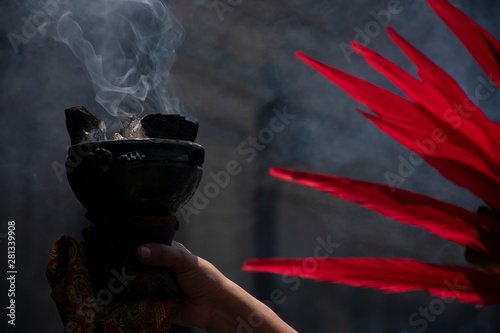 Copal, humo aromático de tradición durante rituales de danza azteca. Sahumerio, incienso. photo