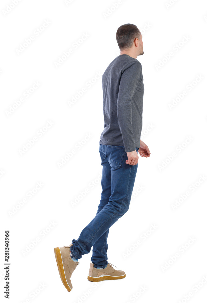 Naklejka premium Side view of going handsome man.