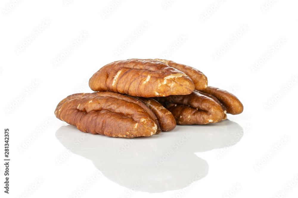 Group of three whole fresh brown pecan nut half heap isolated on white background Group of three whole fresh brown pecan nut half heap isolated on white background