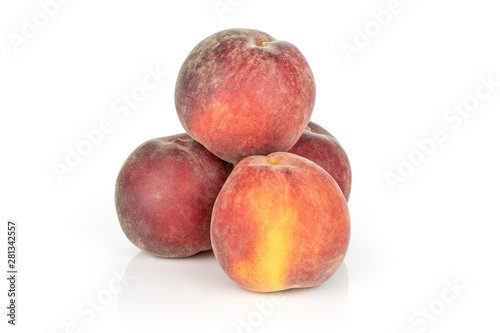 Group of four whole fresh red peach isolated on white background