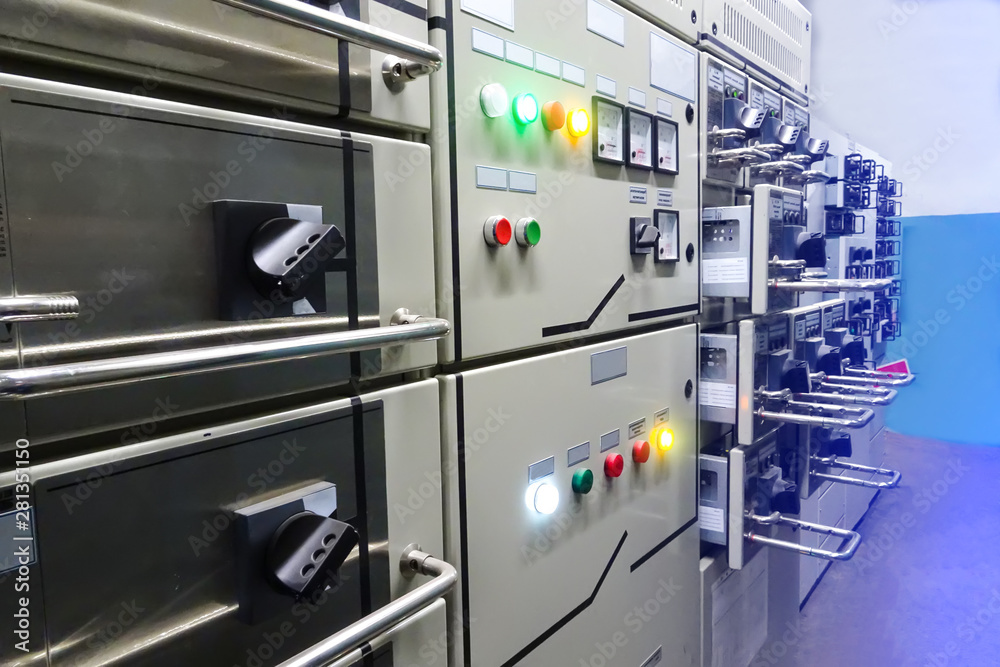 Transformer substation. Control panels, switches, signaling lamps, sensors, scales and buttons. Electric background in industry. Toning. Transformer substation. Control panels, switches, signaling lamps, sensors, scales and buttons. Electric background in industry. Toning.