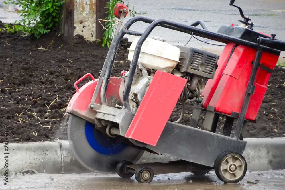 Fototapeta premium Drive asphalt cutter in action