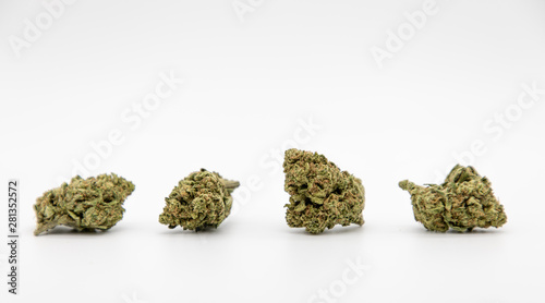 Multiple marijuana buds on white background