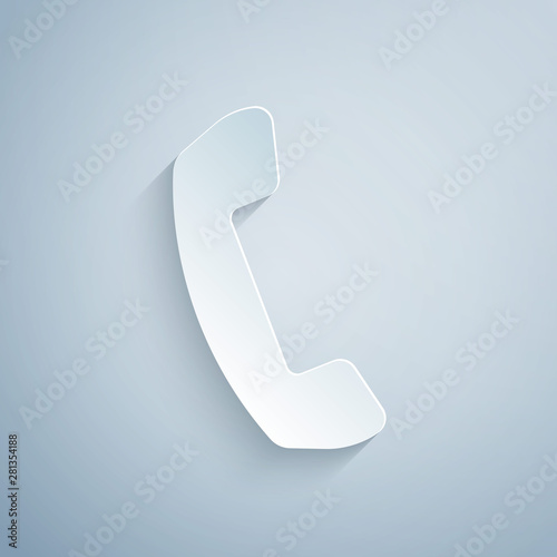 Paper cut Telephone handset icon isolated on grey background. Phone sign. Paper art style. Vector Illustration