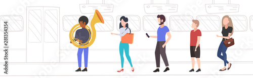 public transport passengers listening man tuba player african american musician playing the baritone in train flat full length horizontal