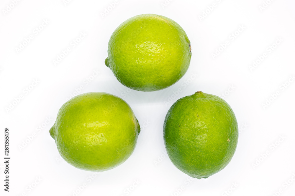 Limes on white background