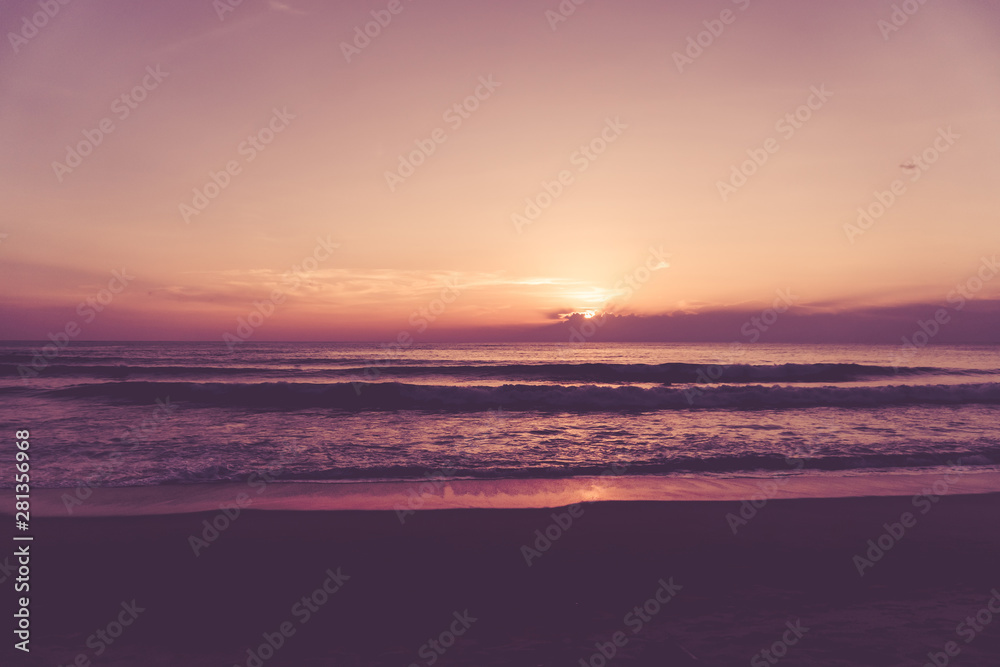 Naklejka premium Tropical nature clean beach and white sand in summer with sun light blue sky and bokeh background.