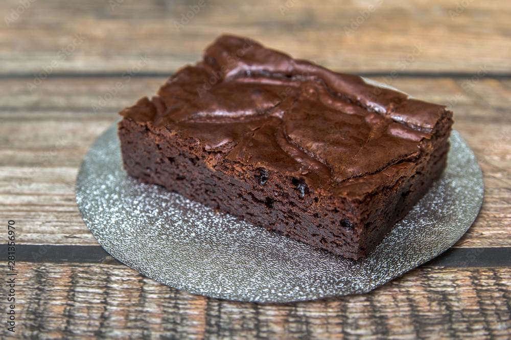 Nutella Brownie on the wood table blackground Nutella Brownie on the wood table blackground