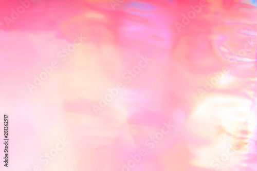 Colorful funky fantasy abstract pink holographic background.
