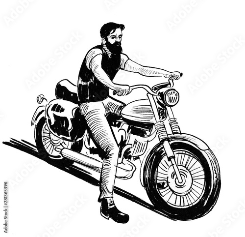 Biker riding a vintage moto...