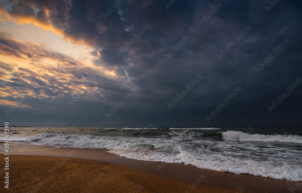 Dark stormy sea and empty beach Dark stormy sea and empty beach