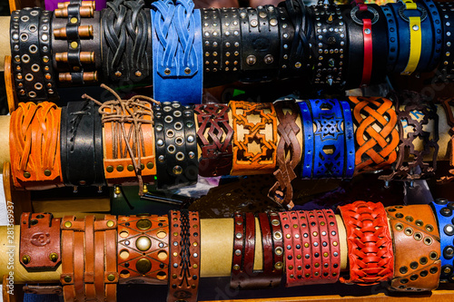 Different leather wristbands for sale on a street fair
