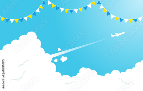 青空に雲と飛行機