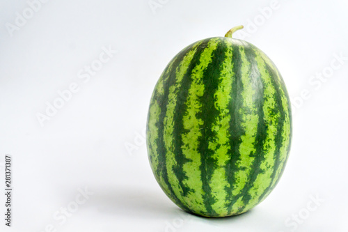 Green watermelon balls on a white background.