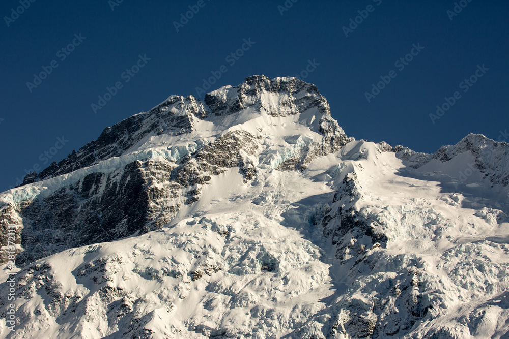 Snow covered mountain peak in the beautiful Southern Alps