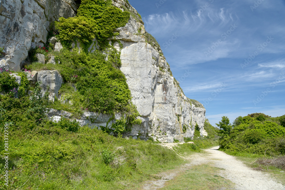 Path along old railway on Portland Bill near Weymouth on the Dorset coast Path along old railway on Portland Bill near Weymouth on the Dorset coast