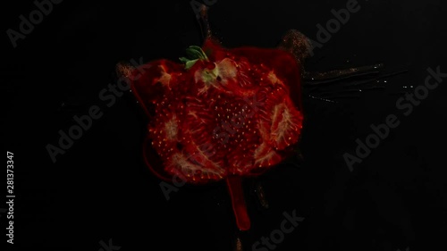 Crush The Whole Strawberry Berry On A Black Background