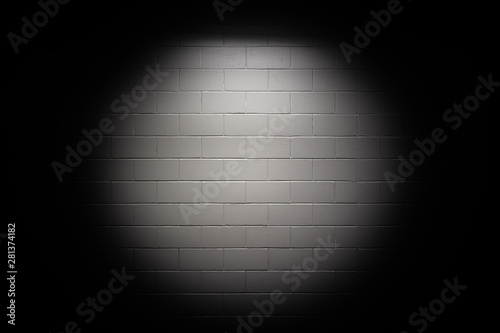 Spotlight on white wall