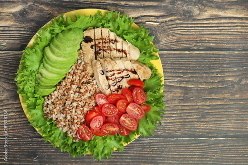Turkey breast, avocado, salad and buckwheat as healthy lunch
