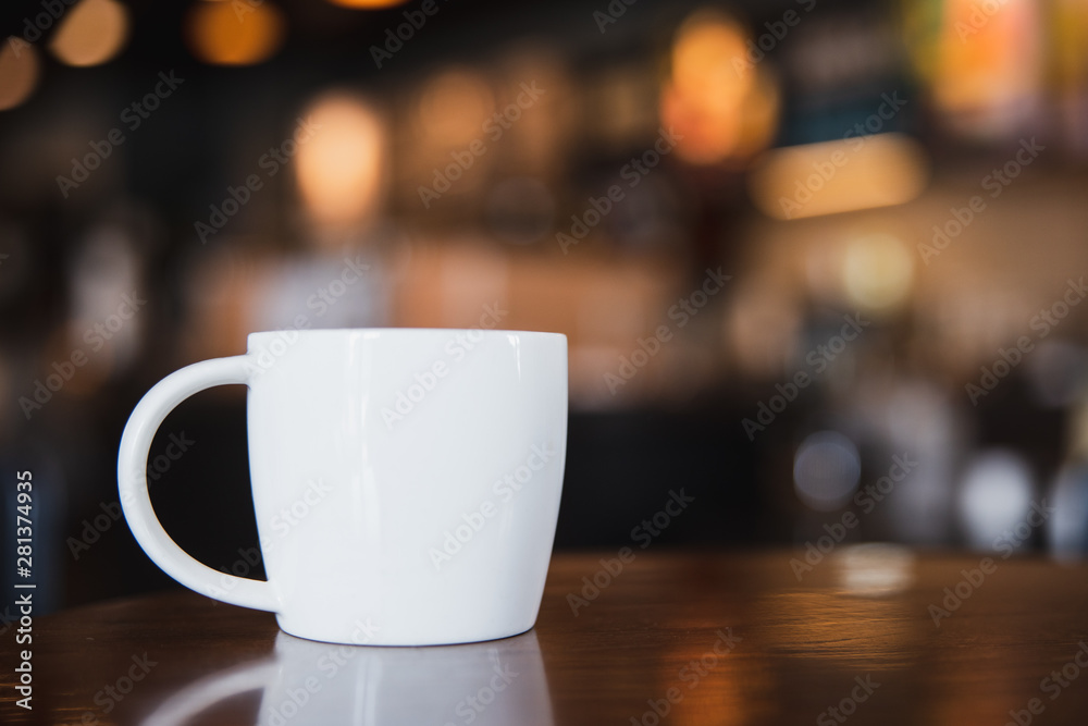 cup of coffee on wooden table in coffee shop with copy space cup of coffee on wooden table in coffee shop with copy space