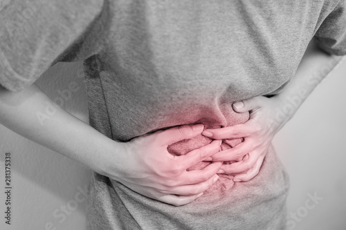 Women with severe abdominal pain. photo