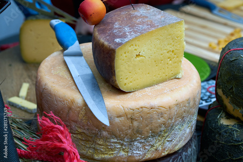 Assortment of tasty cheese on counter. black backgraung photo