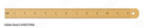 Engineer or architect wooden drafting ruler with an imperial units scale. photo