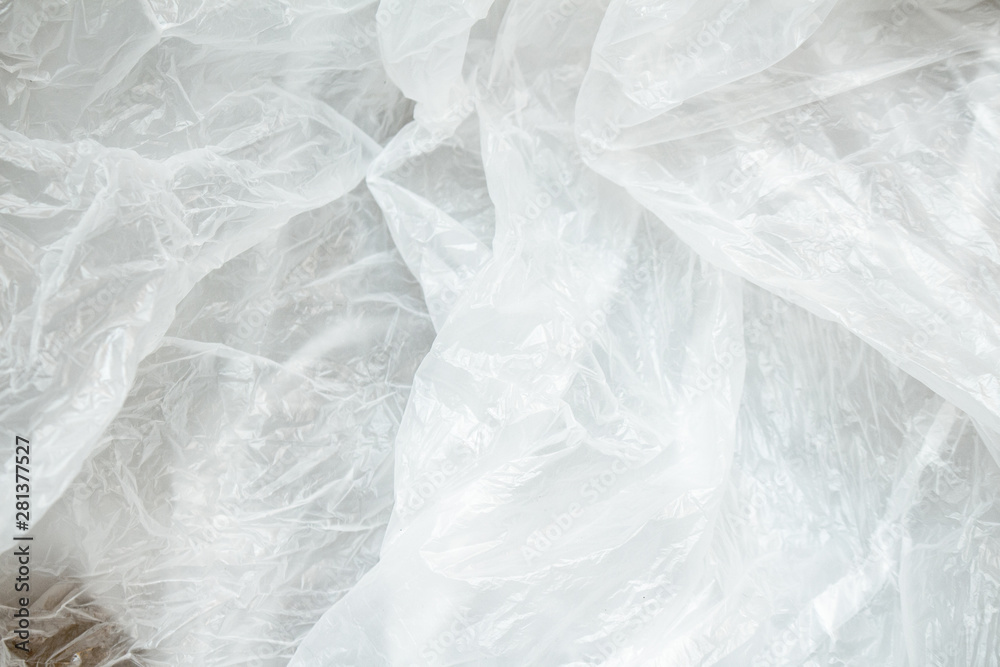 Obraz premium White crumpled plastic background close up polyethylene