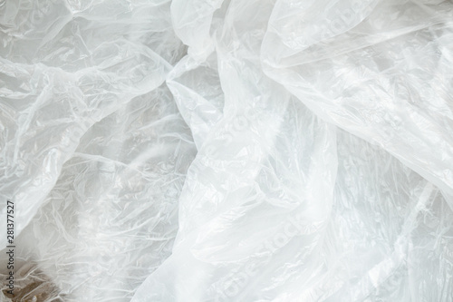 White crumpled plastic background close up polyethylene