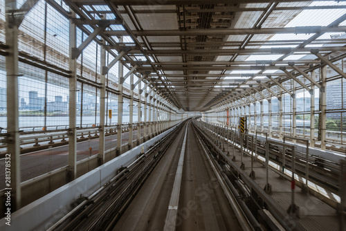 tunnel of monorail road view from front window of a moving train running