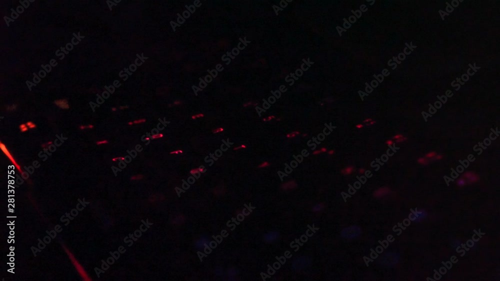 Close-up pictures on the gamer keyboard Bright red, pink, purple, green 4K light motion. Close-up pictures on the gamer keyboard Bright red, pink, purple, green 4K light motion.